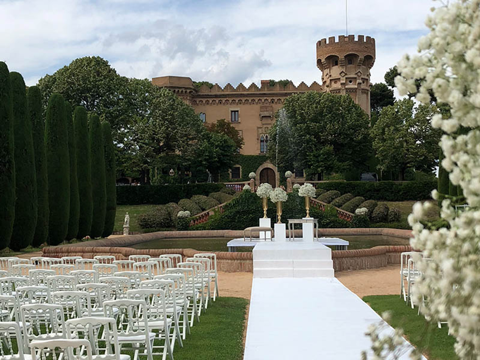 Elegant luxury wedding ceremony at Castell de Sant Marçal in Catalonia, Spain