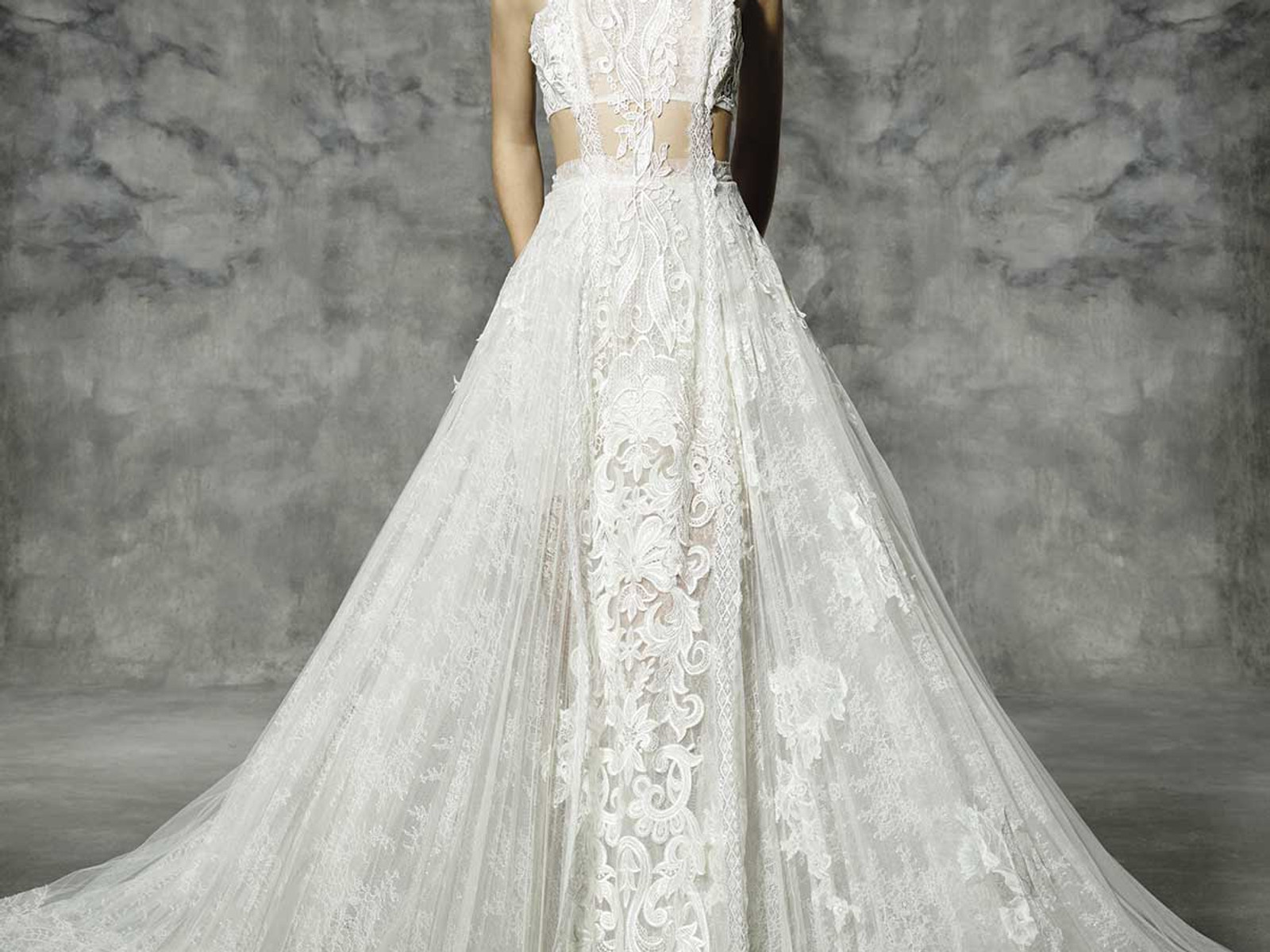 Elegant bridal gown displayed in luxury Barcelona boutique wedding shop