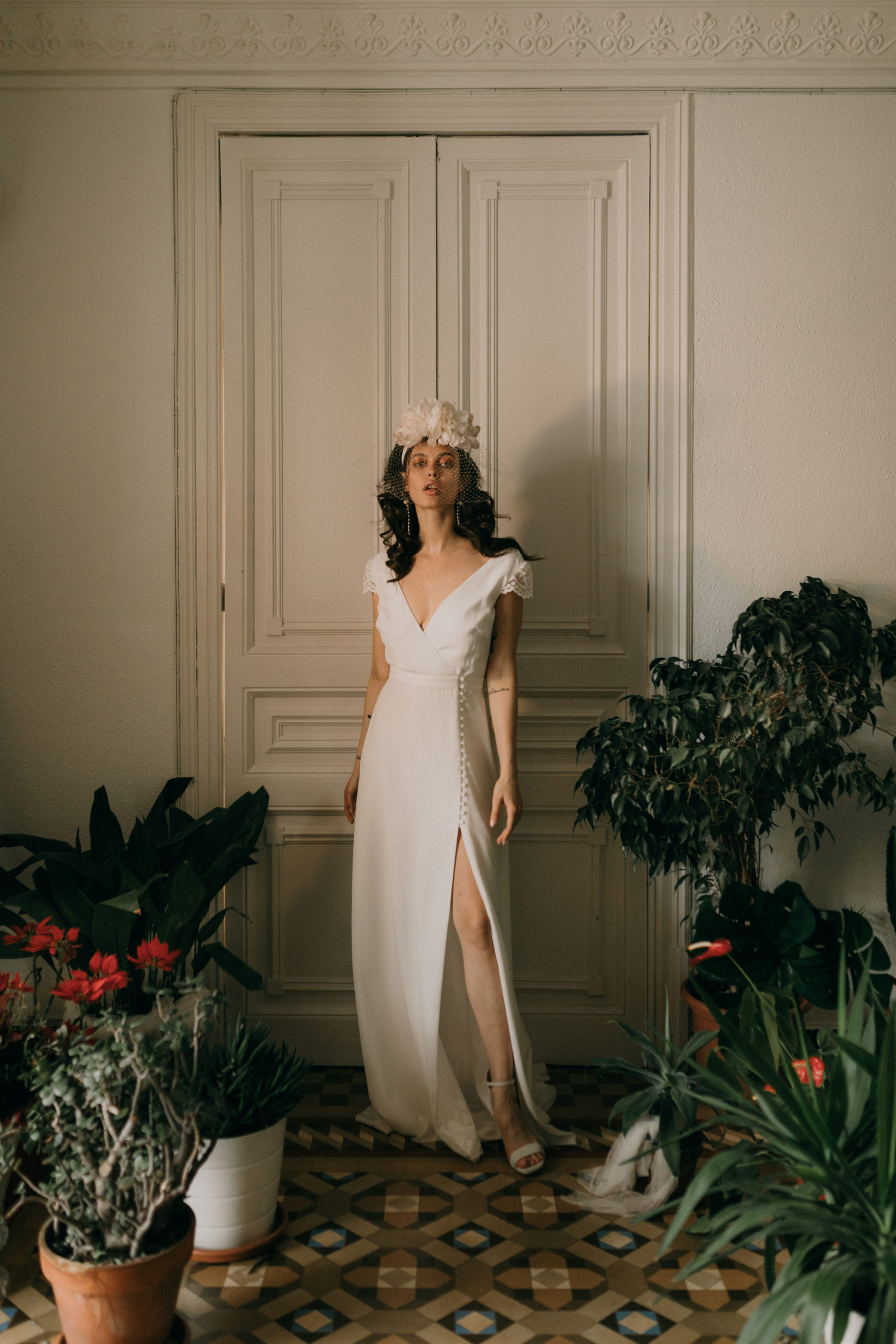 Elegant bridal gown displayed in luxury Barcelona boutique shop