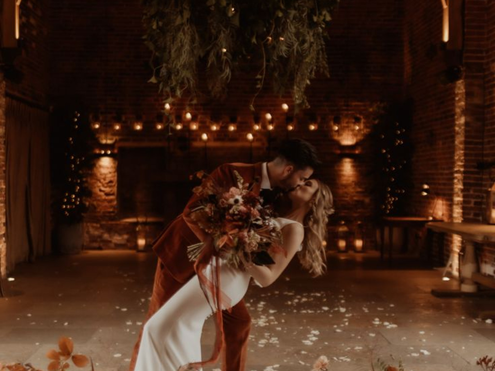 Elegant autumn wedding ceremony in Barcelona with warm seasonal florals and golden light