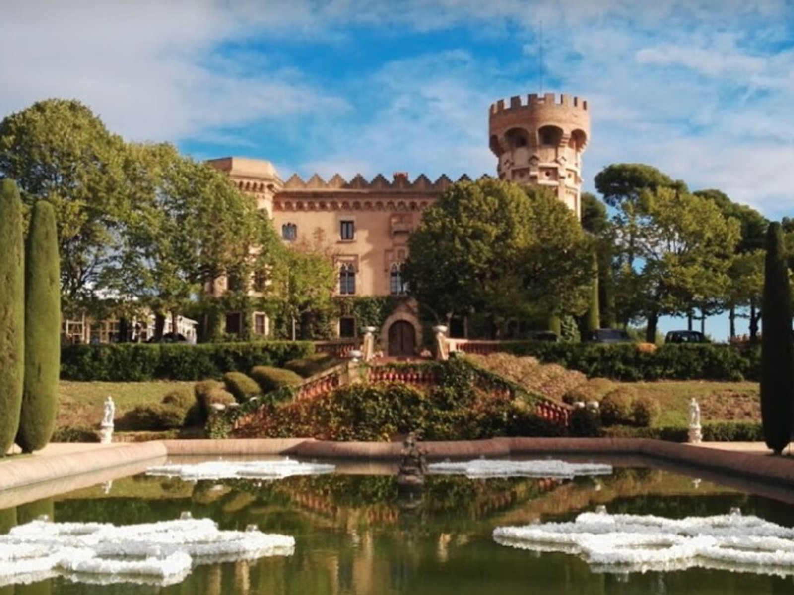 Luxurious Barcelona castle wedding venue with elegant architecture and manicured gardens